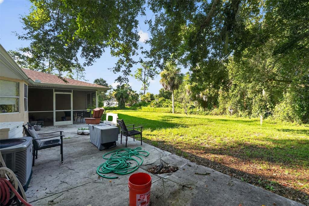 Photo of 1116 Dustin Road, North Port, FL 34288 (MLS # O6435074)