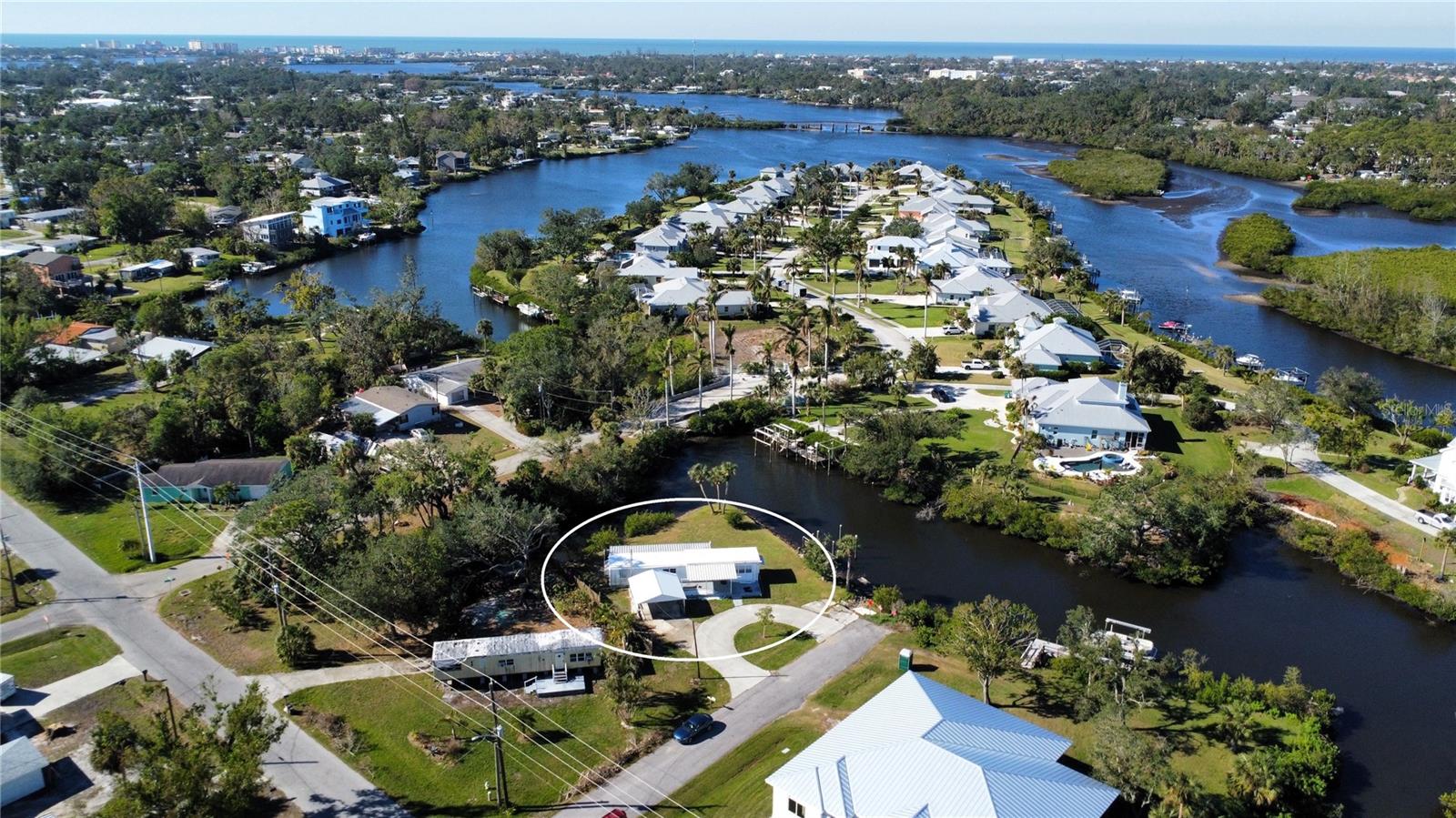 Fantastic waterfront home located in the heart of Nokomis. Waterfront on two sides makes this property unique. 200 feet of waterfrontage. Conveniently located on a cul-de-sac for great privacy. Mobile home located on lot has flooded due to recent storms. Fix it up or tear it down and build your dream home. Home is 2 bed and 2 bath. Roof is 2023. 2013 dock measures 5ft by 20ft. Close to shopping, dining, and Nokomis Public Beach! Also listed as vacant land under MLS: N6135770. Schedule your showing today!