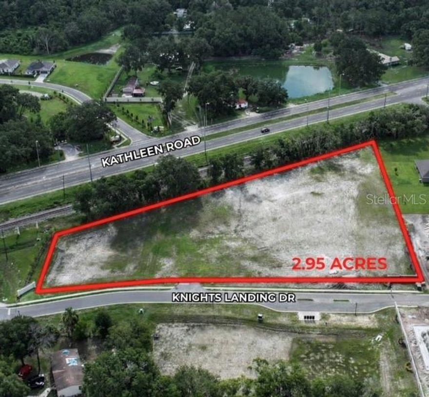 Shovel-Ready Commercial Opportunity at the Entrance of Growing Residential Development
Positioned at the highly visible entrance of a newly developed residential subdivision, this prime commercial opportunity consists of two parcels being sold together (Parcel IDs: 23-27-28-011021-000590 & 23-27-28-011021-000620). The property is zoned Commercial Enclave, making it ideally suited to serve the daily needs of the surrounding and rapidly expanding residential population.

This shovel-ready site offers exceptional development potential with strong frontage, excellent accessibility, and strategic positioning directly along a primary corridor. The location provides natural traffic flow from residents entering and exiting the subdivision, creating a built-in customer base and long-term growth potential.

The Commercial Enclave zoning allows for a variety of neighborhood-serving commercial uses, making the property ideal for a small retail center, convenience store, professional offices, personal service businesses, or quick-service dining establishments. Potential uses may include a neighborhood shopping plaza featuring a pizzeria, salon or barber shop, donut or coffee shop, boutique retail, medical or professional offices, or a convenience market with fuel service (buyer to verify all intended uses with county zoning and planning departments).

Surrounded by established residential growth and continued expansion in the Lakeland market, this property presents a rare opportunity to secure a highly desirable commercial footprint within a developing suburban corridor. The parcels offer flexibility for phased development or a cohesive single project design.

Lakeland continues to experience strong population growth, business expansion, and increasing demand for neighborhood-focused commercial services. This site is perfectly positioned to capitalize on that momentum while offering investors and developers the ability to create a destination that serves both current and future residents.