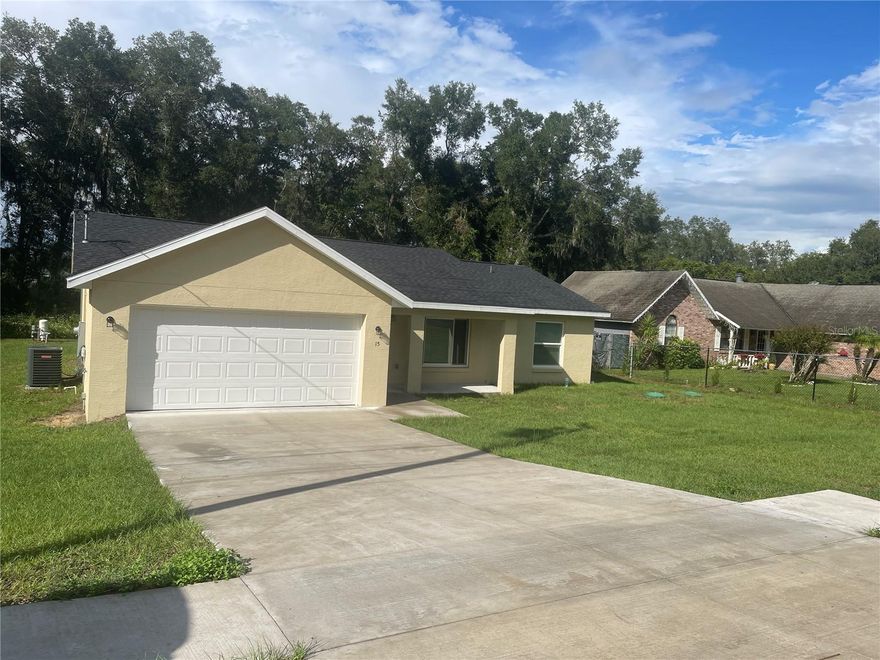 Welcome to your new home in Ocala!
This 3 bed 2 bath 2 car garage is ready for someone to call it home. This home comes complete with a seamless kitchen/ family room combo, plenty of options for storage, 2 guest bedrooms with their own private full bath, and a master bedroom with a walk in closet and master bath with walk in shower. The kitchen has fabulous white shaker cabinets, all stainless steel appliances, and a pantry. The whole home is covered in luxury vinyl making cleaning a breeze. With its own private well and septic lowering utility costs this home has everything your looking for. 
Come tour your new home today!