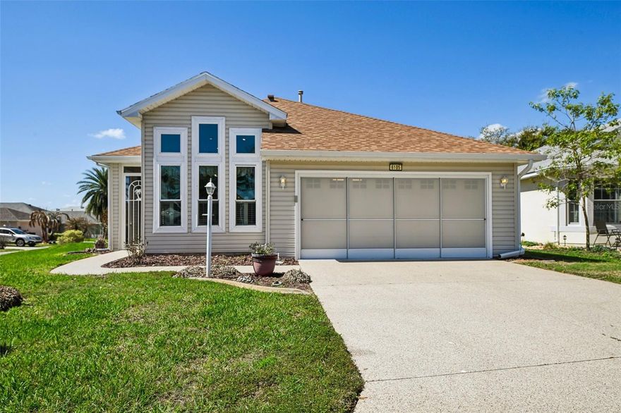 Welcome to the lifestyle you’ve been dreaming about in the beautiful 55+ community of Royal Harbor—a place that feels like a relaxing day at the beach every single day. With swaying palms, friendly neighbors, and scenic waterfront views along Lake Harris, life here is all about easy living and enjoying the sunshine. This meticulously maintained 3-bedroom, 2-bath split-plan home offers the perfect blend of comfort and thoughtful upgrades. From the moment you step through the foyer with elegant ceramic tile floors, you’ll notice the sense of space created by soaring 9-foot and vaulted ceilings, impressive 8-foot doors, rounded corners, and classic six-panel doors that add a touch of luxury throughout. The kitchen is designed to impress, featuring beautiful 42-inch wood cabinetry, gleaming granite countertops, stainless steel appliances, and not one but two pantries for exceptional storage. The spacious great room showcases real wood floors and opens to an all-weather patio—perfect for morning coffee or relaxing evenings. The private primary suite offers a peaceful retreat with a walk-in closet tucked behind a convenient pocket door and a stylish en-suite bath complete with upscale cabinetry, Corian countertops, and a generous walk-in shower. Two additional bedrooms provide flexibility for guests, hobbies, or a home office. Outside, the corner lot offers just the right amount of space with easy maintenance and added privacy. Major updates—including a newer roof, HVAC system, and water heater—mean peace of mind, while a water softener system adds everyday comfort. Life in Royal Harbor is all about enjoying the Florida lifestyle. Cruise the neighborhood by golf cart, stroll along the accessible walking paths, or head down to the waterfront dock on Lake Harris to soak in the view. And the location couldn’t be better—just minutes from the Florida Turnpike and close to medical facilities, shopping, and dining. Spend a fun afternoon exploring the charm of Mount Dora, visit the lively entertainment of The Villages, or enjoy the unique waterfront character of Tavares—known as the Seaplane City. If you’ve been waiting for the perfect forever home in Central Florida, this could be the one. The lifestyle, the location, and the home all come together beautifully here… but opportunities like this don’t last long. Now is the time to make your move.