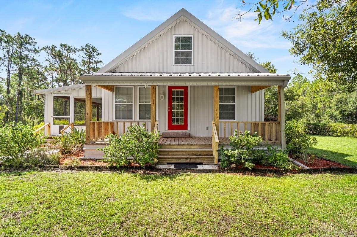 Discover the charm of country living with this adorable two-bedroom, one-and-a-half bath home on .88 acres with no HOA. Nestled among beautiful land and abundant wildlife, this property offers the peace and privacy you've been looking for.
Relax outdoors on the welcoming front porch or enjoy the views from the screened side porch, ideal for morning coffee, quiet evenings, or simply soaking in the surrounding nature. Inside, the home features a cozy layout. The living room and dining room combo flows seamlessly into the kitchen, creating a comfortable and open space for daily living and entertaining. Designed with convenience in mind, both bedrooms are situated downstairs. Upstairs, you will find two versatile bonus rooms-perfect for a game room, hobby space or office, along with the 1/2 bath.
The outdoor boasts three impressive workshops/garages designed for projects, storage, and so much more:
WORKSHOP ONE (24X24)-Bay door access, bathroom, electricity, and plenty of workspace. WORKSHOP TWO (24X30)-Quadruple Bay doors, electricity, with access leading into the THIRD WORKSHOP, (40x24)-Fully equipped with air conditioning, electricity, and an electric chain hoist with trolley system for heavy-duty work. Rare for a residential property, the workshops are equipped with three-phase power- a feature typically reserved for commercial or industrial spaces, offering unmatched capability for heavy equipment or serious projects.
Each structure sits on a concrete slab. Ideal for hobbyists, small business owners, or anyone who needs serious space.
The property is fenced and is accessed through a ranch-style entry gate.
With no HOA, multiple amazing workshops, and plenty of room to enjoy the outdoors, this home and property is a rare opportunity to embrace country living with unbeatable functionality. ZONED RC