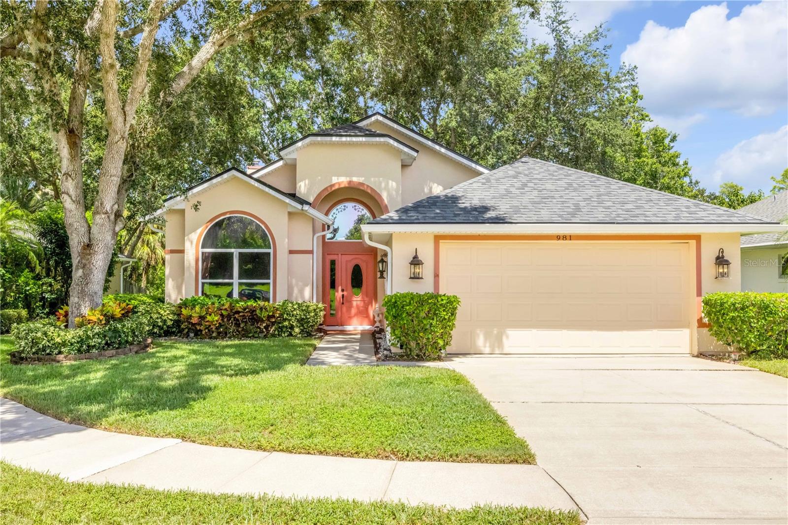 Offered by the original owner, this lovingly maintained, 3-bedroom, 2-bath home offers 2,053 sq ft of light, charm, and thoughtful living design. Nestled in the peaceful, well-established and highly desired Countryside West, this home is located on a quiet cul-de-sac. Step inside to a light, bright open concept layout where architectural details include decorative arched glass accent windows, glass transom interior windows, cathedral ceilings and a lighted recessed niche to showcase your favorite art pieces. Through the foyer you’ll enter a formal dining area perfect for gatherings. The chef’s kitchen boasts stainless steel appliances, under-cabinet lighting, a dishwasher (2024), disposal (2024), and microwave (2024). Enjoy casual meals or snacks in the cozy breakfast nook, at the breakfast bar or in front of the new electric fireplace (2024). The spacious primary suite features a large ensuite bathroom with dual sinks, a soaking tub, separate walk-in shower, walk-in closet, and tucked-away toilet for added privacy. The home also includes a dedicated laundry room and 2-car garage. Major updates include a new roof (2023), new front door (2024), and gutters with leaf guards. Exterior highlights include mature oak trees, irrigation system, sidewalks for evening strolls, and easy access to top-rated schools, shopping, restaurants and just 3.7 miles (as the crow flies) to the beaches of the Atlantic Ocean. This home truly checks all the boxes for style, function, value and location. Don’t miss your opportunity—schedule your private showing today!