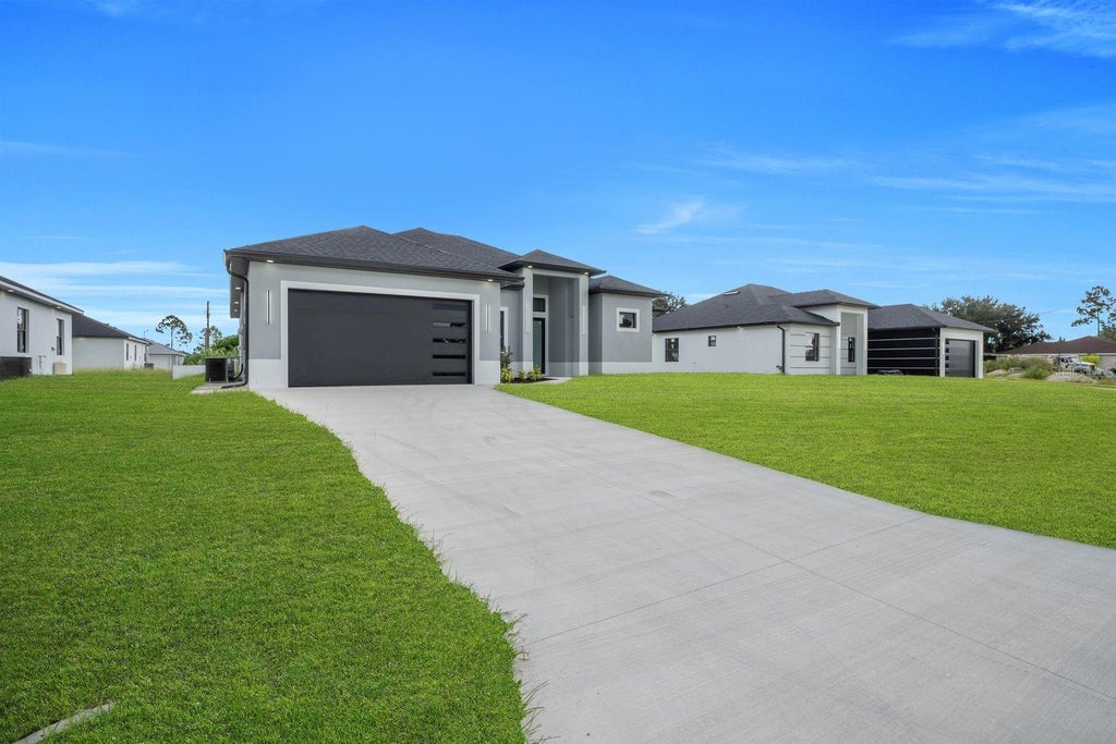 Photo of 3616 6th Street SW, Lehigh Acres, FL 33976 (MLS # A4704166)