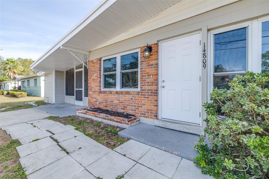 Photo of 14809 N Blvd, Tampa, FL 33613 (MLS # TB8457777)