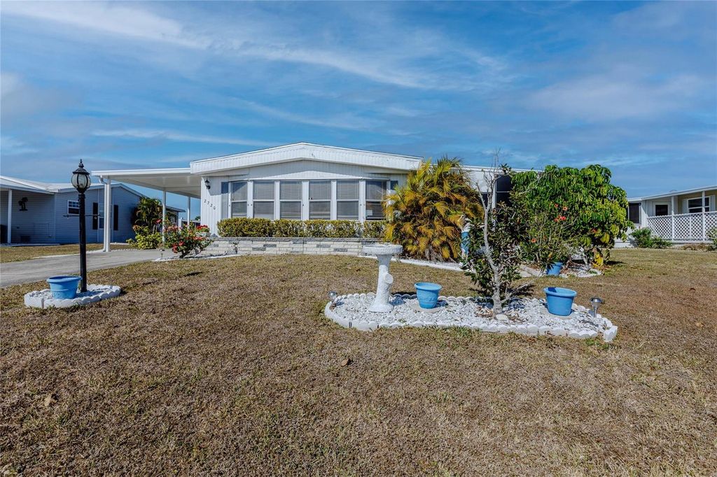 Photo of 2720 Grebe Ln, Englewood, FL 34224 (MLS # C7520972)