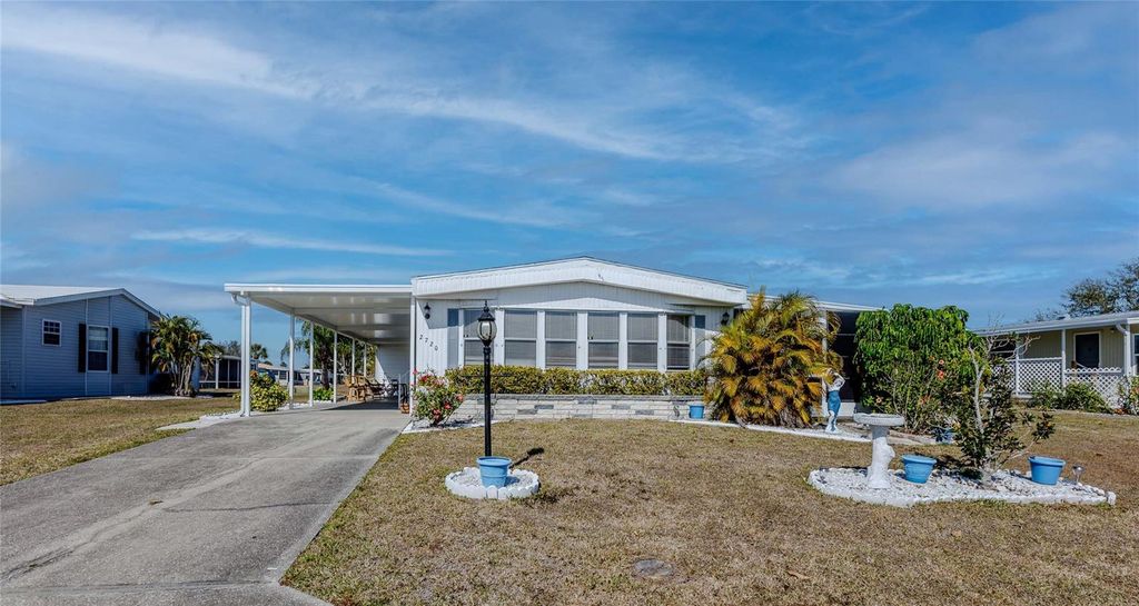 Photo of 2720 Grebe Ln, Englewood, FL 34224 (MLS # C7520972)