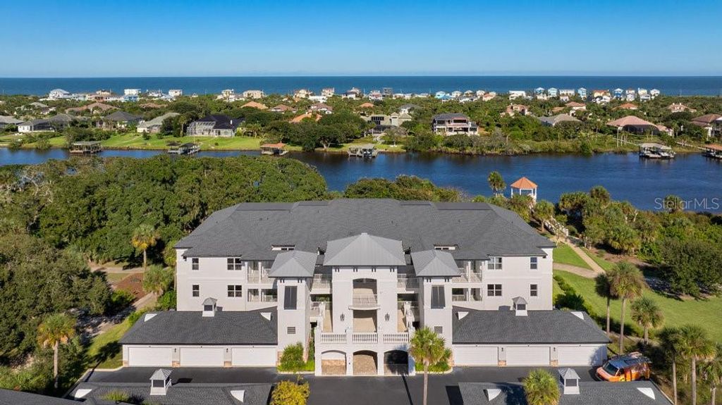 Photo of 455 Riverfront Drive #A202, Palm Coast, FL 32137 (MLS # FC313381)