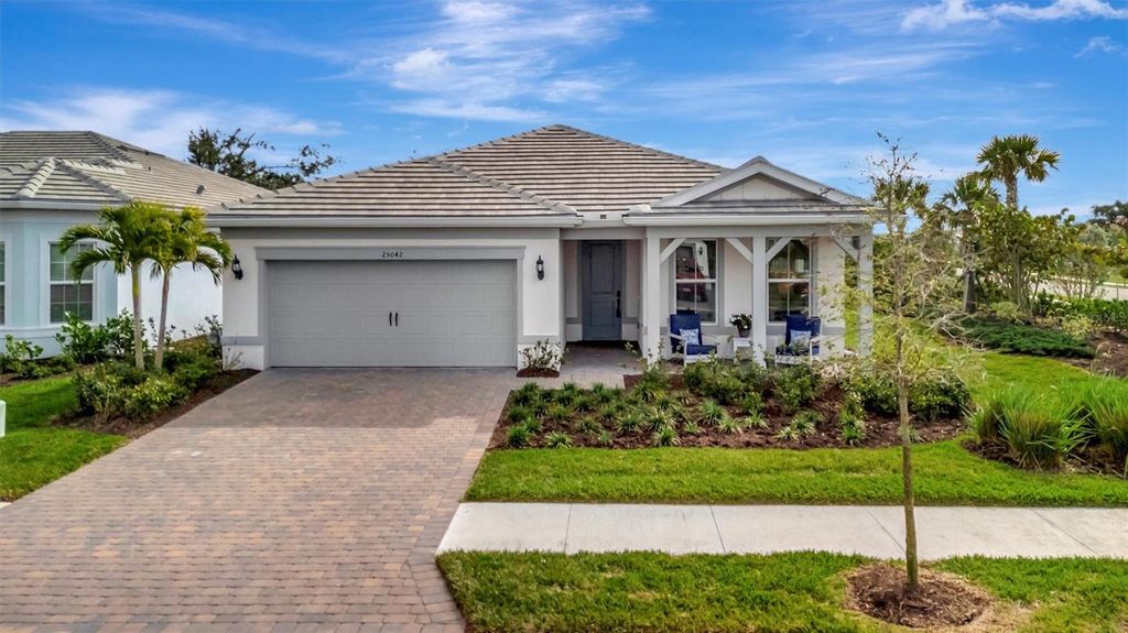 Photo of 25042 Coquina Ridge Way, Englewood, FL 34223 (MLS # A4689881)