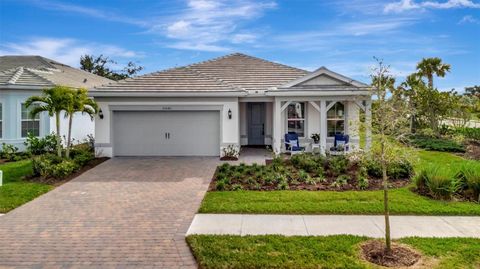 Photo of 25042 Coquina Ridge Way, Englewood, FL 34223 (MLS # A4689881)