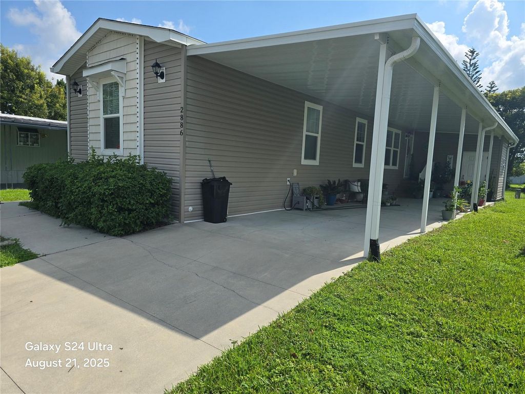 Photo of 2886 Canyon Drive #584, Orlando, FL 32822 (MLS # O6372775)