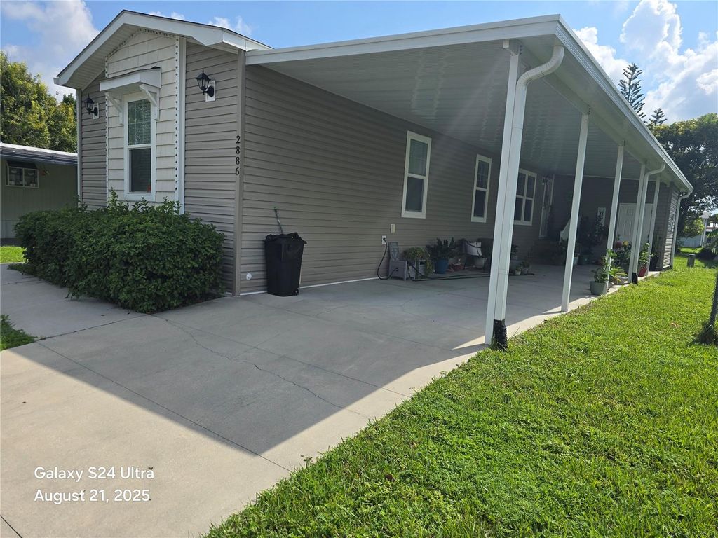 Photo of 2886 Canyon Drive #584, Orlando, FL 32822 (MLS # O6372775)