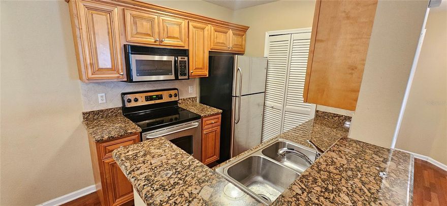 Welcome to this beautifully updated and inviting condo, where comfort and style come together seamlessly. Upon entry, you're greeted by warm wood flooring and an open-concept layout that creates a cozy and welcoming atmosphere.

The modern kitchen features granite countertops, stainless steel appliances, and ample space—perfect for any culinary enthusiast. The spacious master bedroom offers plenty of room to create your ideal retreat and includes a generous walk-in closet. The recently renovated bathroom boasts a contemporary shower/tub combination that adds both style and functionality.

Step out onto your private balcony and enjoy tranquil views of the lake and surrounding trees—ideal for relaxing mornings or peaceful evenings.

Located in a well-maintained community, you'll also have access to amenities such as forest walking trails, a fitness center, swimming pool, and more. Internet is included.

Make this cozy condo your next home—One pet is welcome !