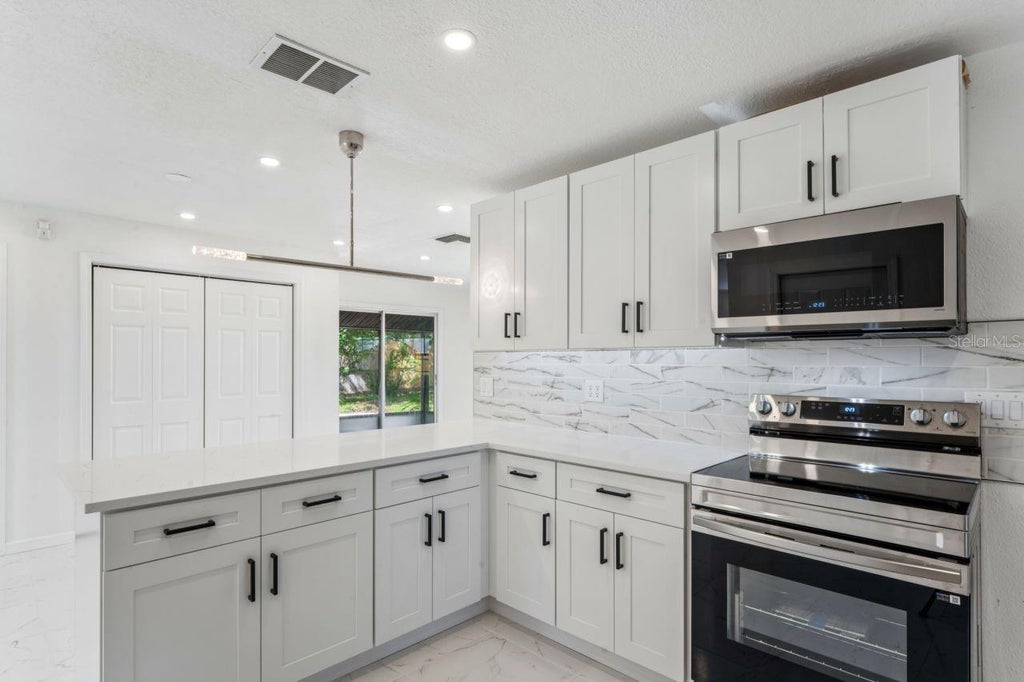 Photo of 31043 Willow Bank Avenue, Brooksville, FL 34602 (MLS # A4709869)