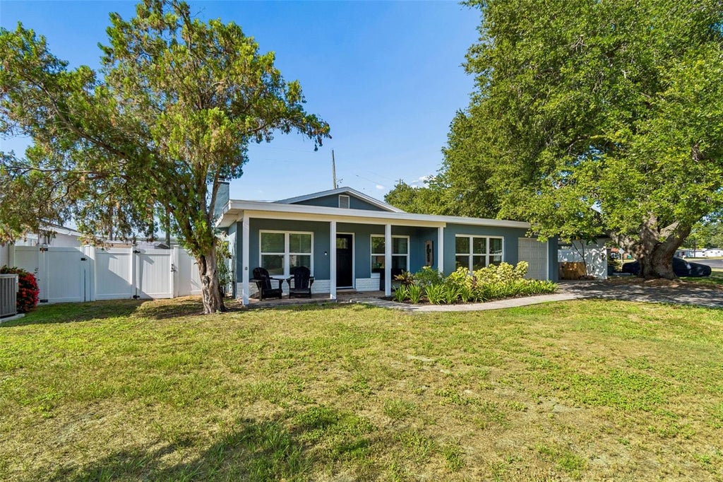 Photo of 10748 Village Green Ave, Seminole, FL 33772 (MLS # TB8526758)