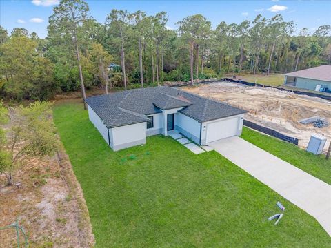 Photo of 2914 67th Street W, Lehigh Acres, FL 33971 (MLS # C7524024)