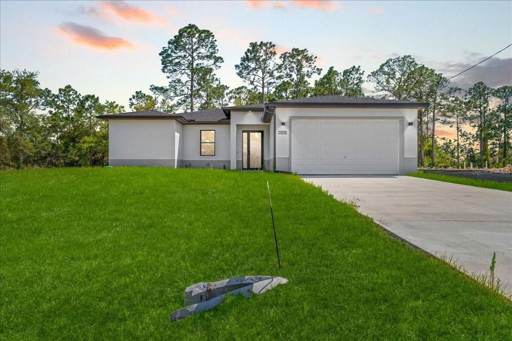 Photo of 2914 67th Street W, Lehigh Acres, FL 33971 (MLS # C7524024)