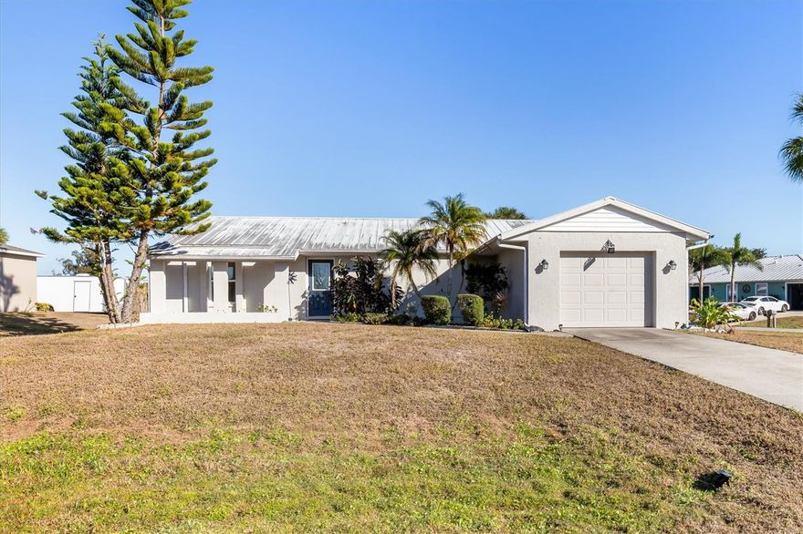 Lovely, well-maintained 3-bedroom, 2-bath home situated on an oversized corner lot with no HOA or deed restrictions. This home features a desirable split floor plan, an oversized 1-car garage, and a solar system installed in 2024 for energy efficiency. The A/C was replaced in 2019. Additional highlights include a 14x10 storage shed, a newly screened lanai enclosure, and many updated windows along with a newer front door. Transferable flood insurance is available. The property has never flooded and is conveniently located near I-75 and Punta Gorda Airport.

Harbor Heights is a friendly community offering a waterfront playground, fishing docks, a new public boat ramp/launch, and recreational amenities including tennis, pickleball, shuffleboard, and basketball courts. Residents may also join the Harbor Heights Civic Association to participate in community events. Easy to show — a must see!