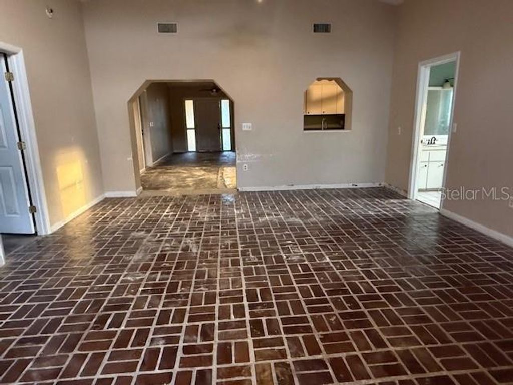 Photo of 701 Madison Street, Tavares, FL 32778 (MLS # OM721085)