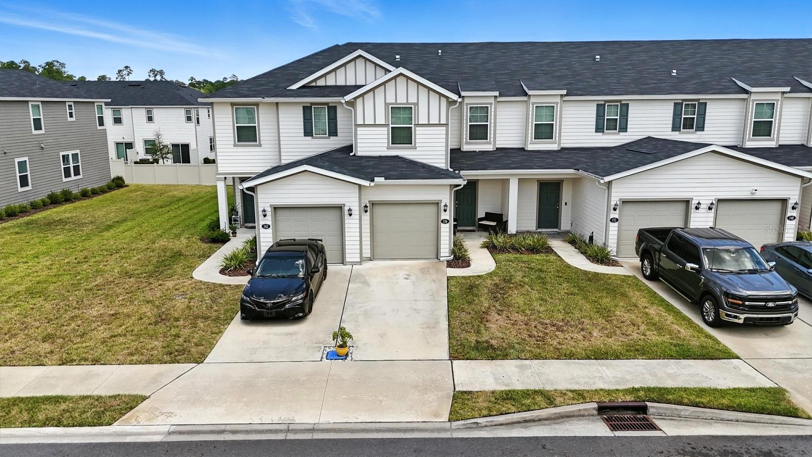 Welcome to 156 Great Star Ct, a charming 3 bedroom, 2.5 bath home nestled in the desirable Orchard Park community of St. Augustine. This move-in-ready home features a spacious open floor plan downstairs with a half bath and seamless flow from the living area to the dining space and kitchen—ideal for entertaining. Sliding glass doors lead to a quiet, open yard, perfect for relaxing or hosting gatherings. Enjoy peace of mind with a 3-year-old HVAC system and water heater, plus the convenience of a 1-car garage. Located just minutes from Treaty Park, local grocery stores, shops, golf courses, historic downtown, and the beaches, this home offers the best of St. Augustine living in a walkable, vibrant location.