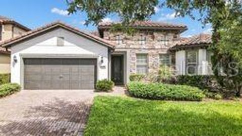 Photo of 10944 Citron Oaks Drive, Orlando, FL 32836 (MLS # O6398261)