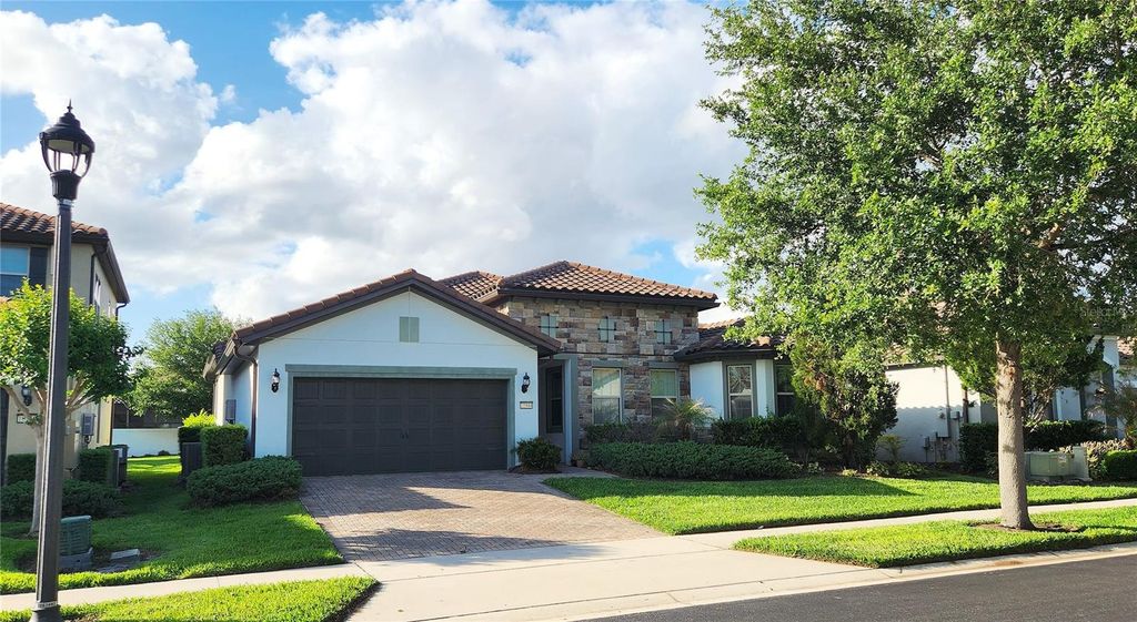 Photo of 10944 Citron Oaks Drive, Orlando, FL 32836 (MLS # O6398261)