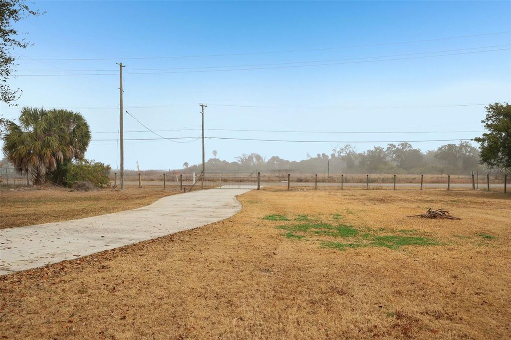 Photo of 7029 Symmes Road, Gibsonton, FL 33534 (MLS # TB8476208)