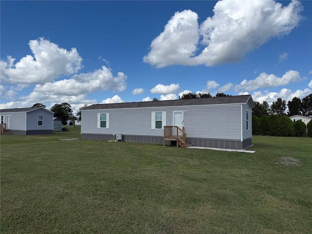 Photo of 1101 NW 12th Ln, Lake Panasoffkee, FL 33538 (MLS # G5103587)