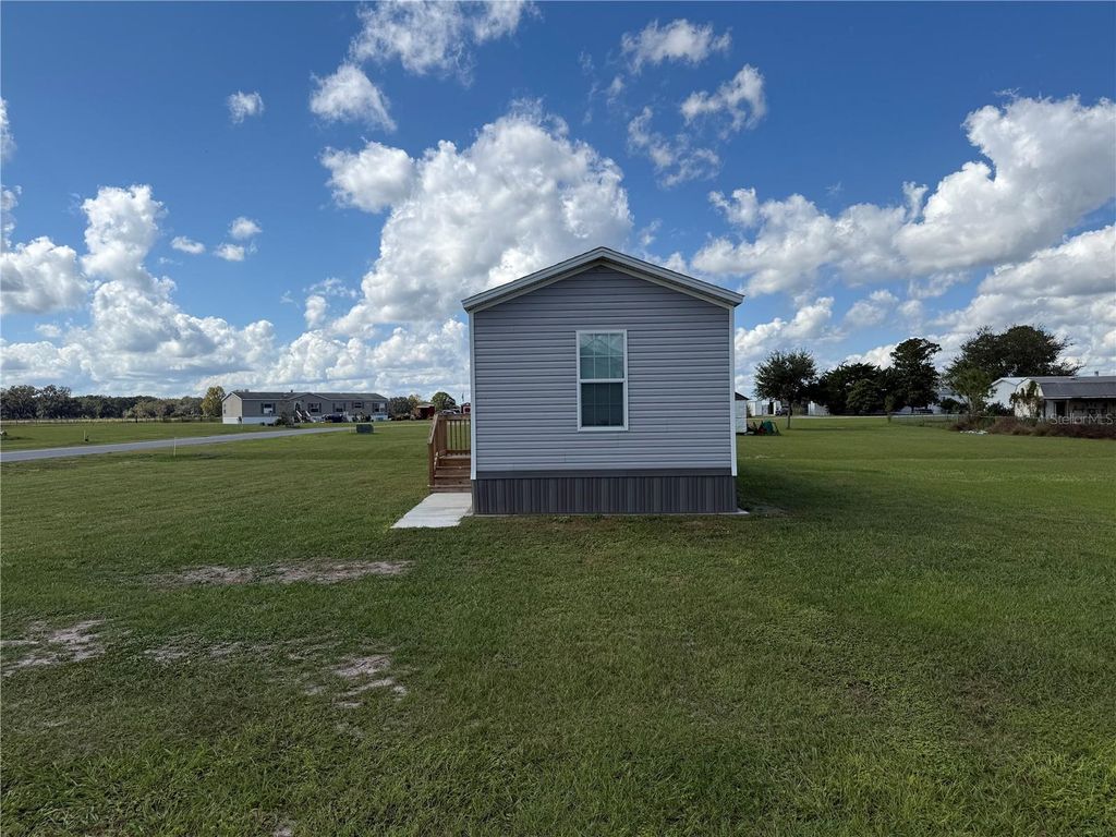 Photo of 1101 NW 12th Ln, Lake Panasoffkee, FL 33538 (MLS # G5103587)