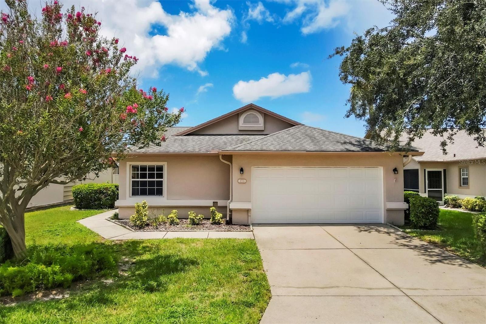 Discover this spacious 1,866 sq ft residence nestled within the highly desirable Peridia Golf & Country Club community. This 2-bedroom, 2-bathroom home features a versatile den/bonus room and an open floor plan designed for comfortable living and effortless entertaining. The dining area seamlessly connects to the living room and bonus space, perfect for hosting gatherings.
Bright and inviting, the unit boasts new window treatments and abundant natural light. Expand your living space by opening the sliding glass door to the enclosed patio, or enjoy outdoor grilling on the second patio. Additional highlights include a two-car garage, an eat-in kitchen with ample cabinetry, and convenient access to cable, internet, and lawn maintenance—all included in the HOA fees. Importantly, there are no CDD fees.
As part of the community, residents enjoy a golf membership that grants access to tennis, pickleball, a clubhouse for social events, a heated pool, and a tiki bar. The location offers easy proximity to shopping, dining, beautiful sandy beaches, and airports, making this an ideal place to call home.