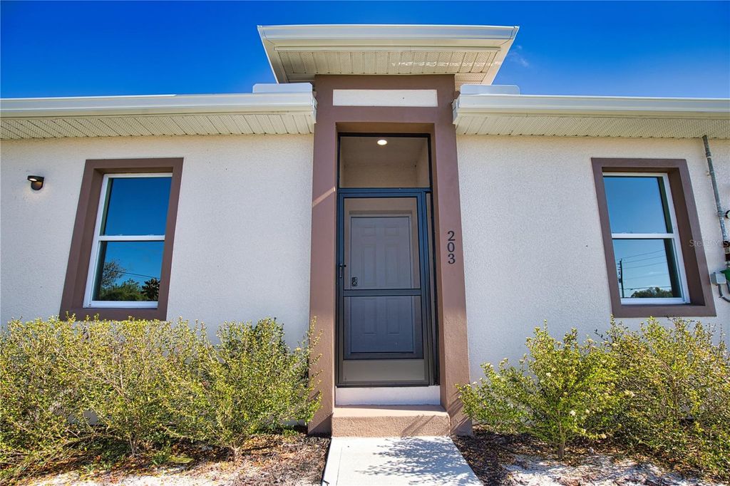Photo of 289 Boundary Boulevard #202, Rotonda West, FL 33947 (MLS # TB8506175)