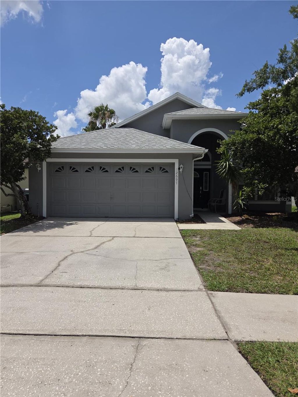 Photo of 12697 Enclave Drive, Orlando, FL 32837 (MLS # S5151524)