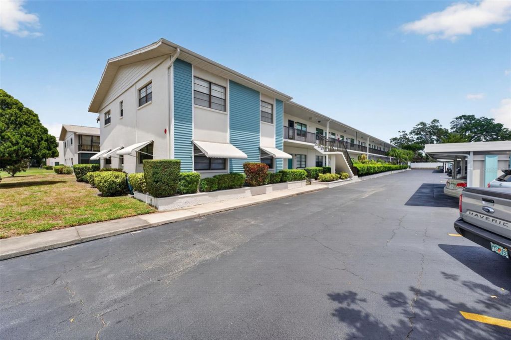 Photo of 5925 Terrace Park Drive N #203, St Petersburg, FL 33709 (MLS # TB8500678)