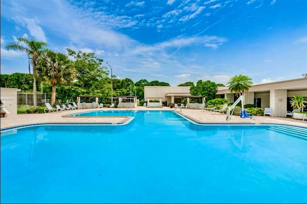 Photo of 5925 Terrace Park Drive N #203, St Petersburg, FL 33709 (MLS # TB8500678)