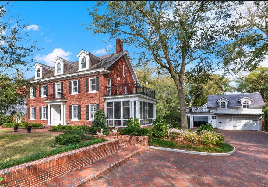 This stunning Lake Cherokee estate is an example of what historic preservation should be: honoring the home’s architectural past while making updates that reflect modern living. Awarded the Mayor’s Outstanding Residential Property of the Year, this 1922 Colonial Revival home offers 5,137 sq ft across four levels, including an 857 sq ft air-conditioned basement. The renovated kitchen (2020) is a chef’s dream, while refinished original oak & pine wood floors and restored plaster details preserve the home’s history. Situated on a .71-acre lot, the fully fenced / gated property features a pool and spa (2018), 466 sq ft pool house/game room with wet bar, full bathroom, & wine room, and multiple indoor/outdoor spaces for relaxing or entertaining. The carriage house includes a 2-car tandem garage, carport, and 734 sq ft guest apartment with laundry & roof deck. Just a 5-minute walk to the Wellborn for brunch or cocktails, and 10 minutes to the Dr. Phillips Center. Download this property’s list of features for more detailed information, and SCHEDULE YOUR TOUR today!