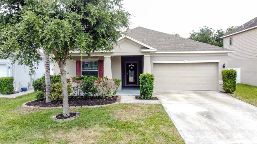 Nestled within the desirable Cambria community in Davenport, this beautifully designed 4-bedroom, 2-bathroom home offers the perfect blend of comfort, style, and everyday functionality. From the moment you arrive, the charming covered front porch and contemporary curb appeal create a warm and welcoming first impression. Inside, you will discover a thoughtfully designed open floor plan ideal for both relaxing and entertaining. The spacious great room serves as the heart of the home, flowing effortlessly into the kitchen and dining area to create an inviting setting for gatherings with family and friends. The kitchen is beautifully appointed with 42” cabinetry, solid surface countertops, stainless steel appliances, a pantry, and abundant workspace for cooking and entertaining. Extensive ceramic tile flooring throughout the main living areas adds both elegance and easy maintenance. The private primary suite offers a peaceful retreat with a spacious layout and a luxurious garden bath featuring a separate shower, designed for relaxation after a long day. Three additional bedrooms offer versatility for family, guests, a home office, or creative space. Step outside to the rear patio area, offering additional space to enjoy outdoor living, morning coffee, or Florida evenings year-round. Additional highlights include an indoor utility room, washer and dryer, a two-car garage, quality construction by Maronda Homes, and the added peace of mind of a one-year home warranty being offered by the seller. Perfectly positioned near I-4, shopping, dining, schools, and Central Florida’s world-famous attractions, this home offers convenience, comfort, and a lifestyle buyers will truly appreciate. Whether you are searching for a primary residence, vacation retreat, or investment opportunity, this exceptional property is ready to welcome you home.