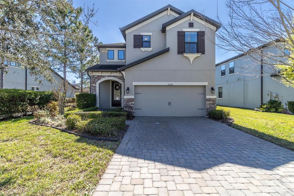 Photo of 12336 Tibbetts Street, Odessa, FL 33556 (MLS # W7883410)