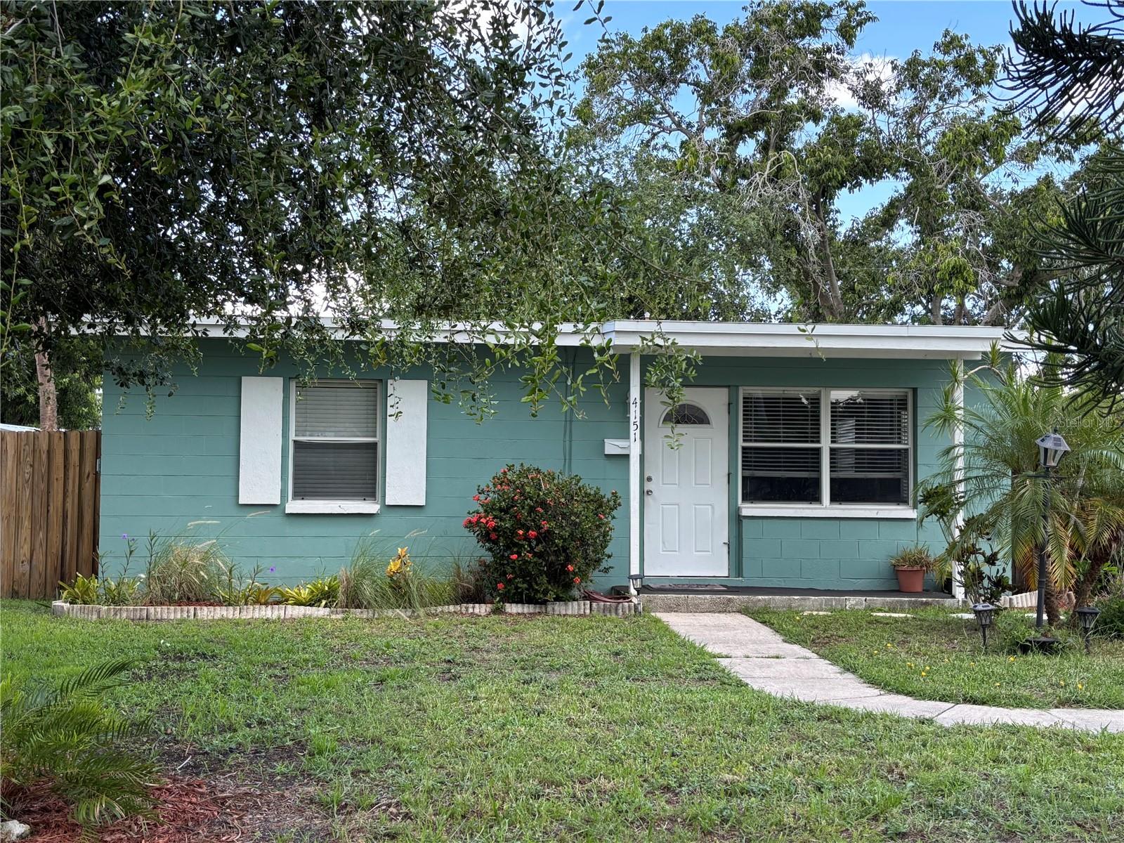 Welcome to your quaint cottage on Coquina Key! Solid block home with the roof replaced in 2020 has never flooded. Pulling up to the home, you will love the inviting curb appeal. Upon entering, you will find a cozy living space with lovely natural lighting that flows into the kitchen and then leads to a well sized patio in the very large back yard. Off to the left side of the house are the two bedrooms and bathroom. The bathroom was recently updated and has a very peaceful, spa like feel. Both bedrooms have a very nice lighting to them, and well sized closets. Out in the back, you have ample space for just about anything. Potentially you could add on to this house, or install a pool. There is a small garden with corn and spinach. Two large sheds provide storage for lawn equipment and anything else. The double gate will allow you to pull a boat in, or other extra toys. Coquina Key is a charming neighborhood with dog parks and playgrounds. The welcoming feeling coming over the bridge will make you happy. Nearby are Mullet's Fish Camp, Big Catch at Salt Creek, Kahwa Coffee, Pete's Bagels, and the legendary Chattaways. Downtown St Pete is a quick drive straight up 6th St South, which becomes 4th Street S. Come see your new home and enjoy the lifestyle in Southeast St Pete.