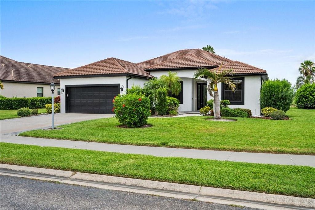 Photo of 1835 Bobcat Trail, North Port, FL 34288 (MLS # C7527846)