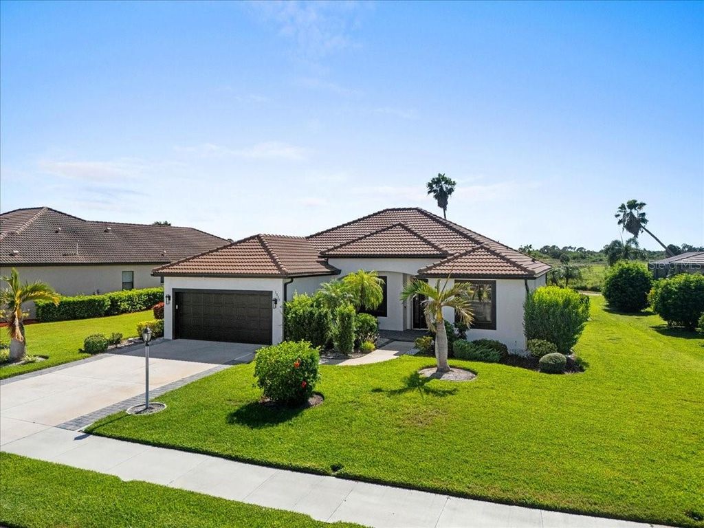 Photo of 1835 Bobcat Trail, North Port, FL 34288 (MLS # C7527846)