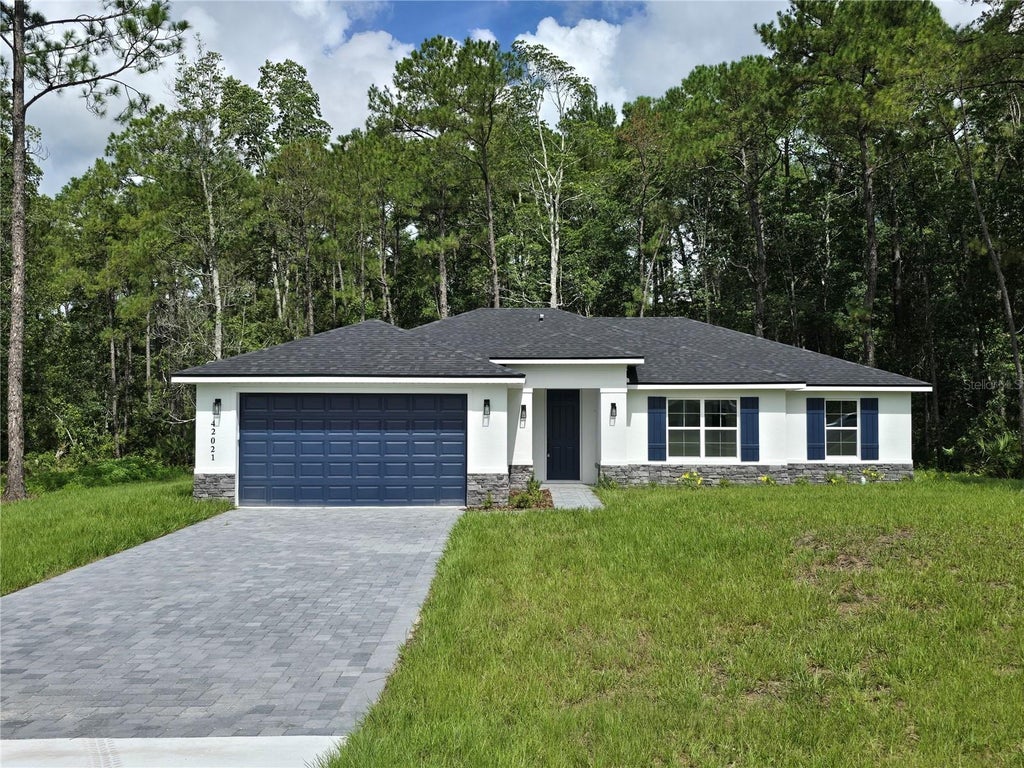 Photo of 42021 Tamarac Street, Eustis, FL 32736 (MLS # O6432870)
