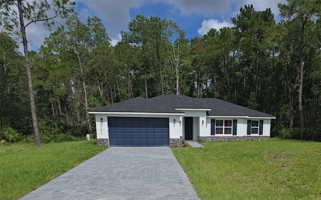 Photo of 42021 Tamarac Street, Eustis, FL 32736 (MLS # O6432870)