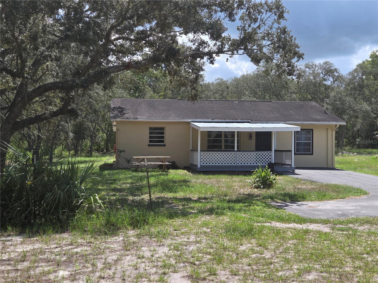 A charming 3-bedroom, 2-bath home with an upgraded kitchen, and a custom primary suite set in a peaceful sanctuary surrounded by mature trees. Embrace the Florida lifestyle with endless outdoor adventures just minutes from your door! Spend your weekends exploring the natural beauty of Weeki Wachee Springs State Park, only 9 miles away—where you can kayak through winding waterways, float along lazy river tubes, or take a refreshing dip in the crystal-clear springs. Just 15 miles away, Veterans Memorial Park invites you to stay active with its scenic walking trails, sports fields, and peaceful picnic spots. When you're ready for coastal charm, Hudson Beach is a quick 12-mile drive and offers sandy shores, a full-service marina, and waterfront dining—ideal for soaking up sunsets and enjoying a laid-back day by the Gulf.