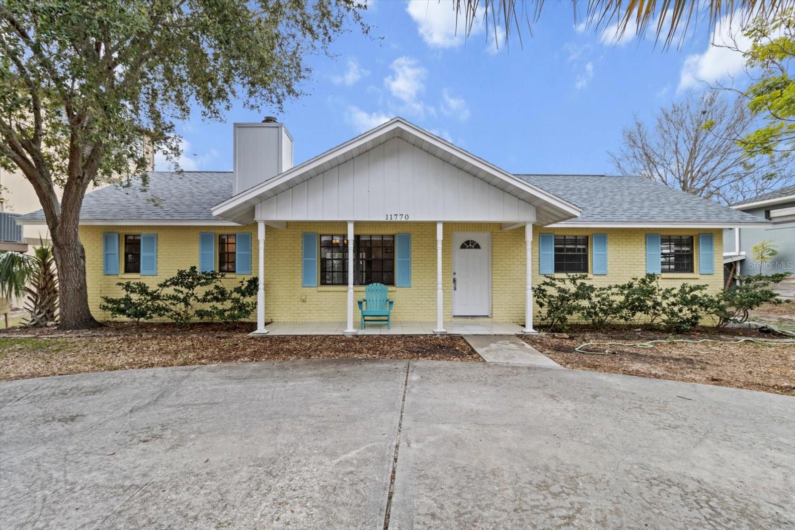 Waterfront with direct ACCESS to the Gulf - Better than NEW - Totally renovated! Short term rentals allowed - 3 bedrooms, 2 baths, wood burning fireplace- huge screened lanai on rear 13x52; totally tiled flooring - entire house tile flooring, wood cabinets, granite counters, all new stainless appliances, architectural shingles - new roof in 2022- ready to MOVE IN or RENT OUT!