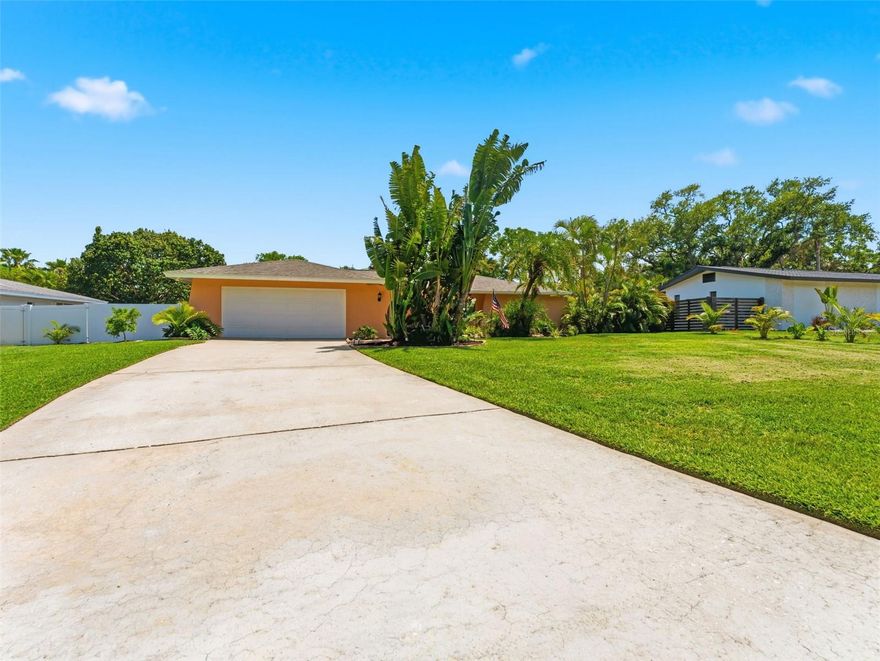 Welcome to this beautifully remodeled ranch-style home situated on a large oversized lot in the highly sought-after community of Del Oro Groves, just a short walk to charming downtown Safety Harbor with its restaurants, shops, parks, and waterfront activities. Offering the perfect split floorplan, this home provides privacy and flexibility for everyone, with two bedrooms featuring their own private bathrooms, while the third bedroom includes a half bath with sink and vanity and the potential to easily convert into a full third bathroom. Both full bathrooms have been gorgeously updated, including one with convenient direct access to the pool area. Filled with an abundance of natural light, this home offers exceptional living and entertaining space with a formal living room, separate dining room, spacious family room, and additional dining area adjacent to the kitchen. The completely remodeled interior showcases new luxury vinyl flooring throughout, fresh interior paint, no popcorn ceilings & new fixtures, gorgeous updated bathrooms, and more! The stunning brand-new kitchen has been completely redesigned and serves as the true centerpiece of the home, featuring elegant granite countertops, custom-style wood cabinetry with abundant storage, stainless steel appliances, a beautifully tiled beveled backsplash, modern hardware, and the perfect functional layout perfect for both everyday living and entertaining guests. This home has also undergone extensive major system upgrades, offering true peace of mind for years to come. The roof was replaced in November 2022, the HVAC system was updated in 2024, and the home features all NEW IMPACT windows and sliding glass doors throughout. A brand-new electrical panel was installed in 2025, while the pool has been meticulously maintained with a resurfacing completed in 2020, along with a new pool pump and filter installed this year. The screened pool enclosure has also been completely replaced (2025) and upgraded with no-see-um screens along the top for added comfort and enjoyment year-round. The exterior of the home is equally impressive, featuring fresh exterior paint, all new professional landscaping, and a brand-new fully fenced white vinyl backyard with double gates on both sides — ideal for additional storage, boats, trailers, or recreational toys. Best of all, this home stayed HIGH & DRY! Completely move-in ready and meticulously updated from top to bottom, this is the one you've been waiting for. Schedule your private showing today!