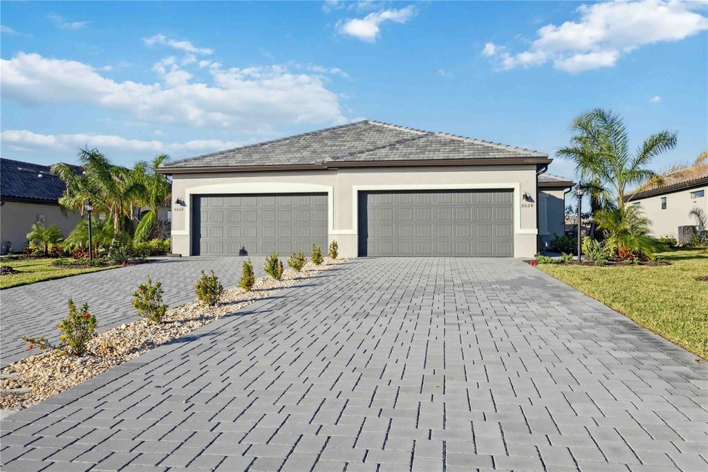 Photo of 5532 Sapphire Stone Cove, Bradenton, FL 34211 (MLS # A4675422)