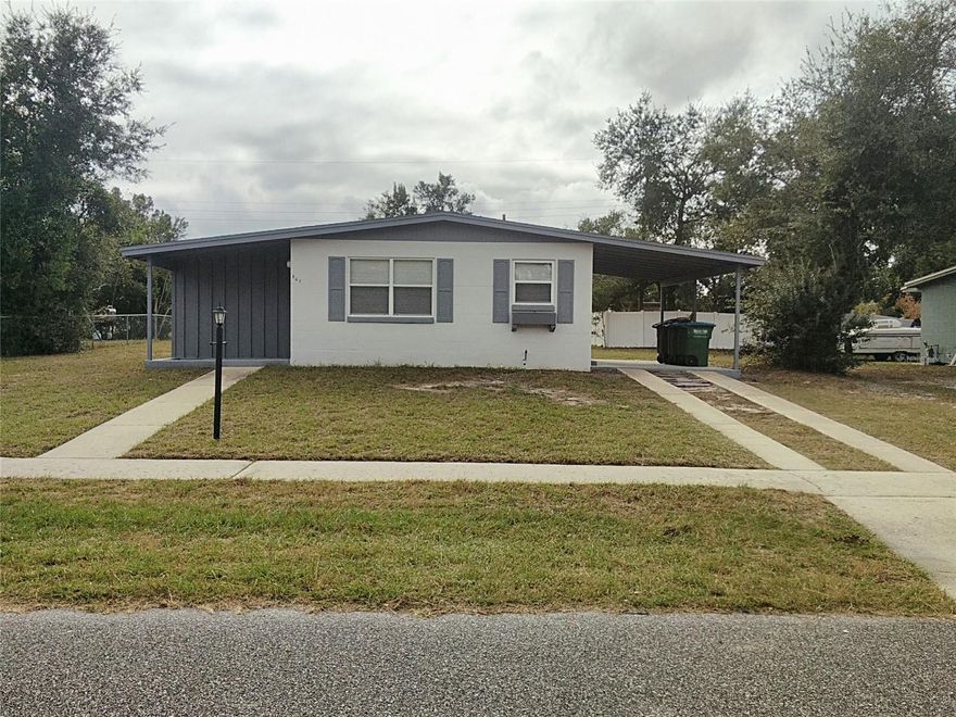 Nice Deltona Rental waiting for you!  (3) Bedrooms · (1) Bath · (1) Oversized Carport (11x20)  CLEAN!  EASY SHOW!  Freshly painted · Tile throughout · New custom tile in bathroom · Blinds on all windows · New microwave + MUCH MORE!  Possible SMALL pet friendly.  CALL TODAY!!  Prospective tenant(s) must have a minimum monthly income of $3,800 to qualify.