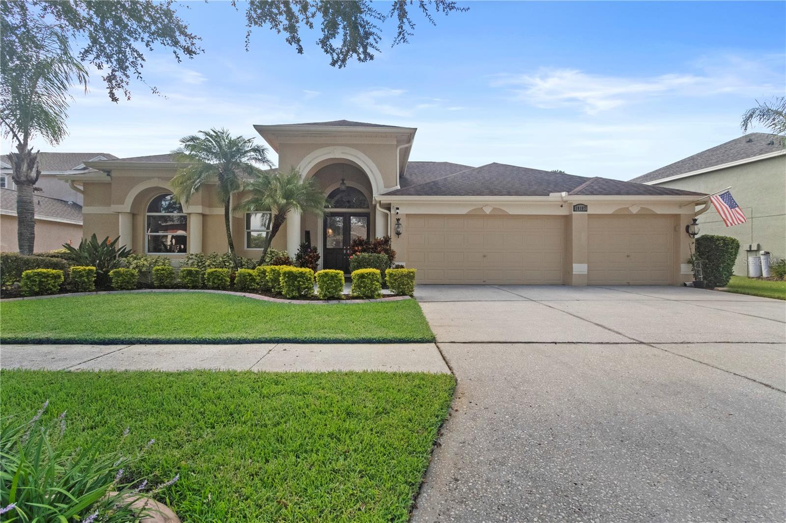 Step into timeless Florida living in this spacious and move in ready 4-bedroom, 3-bath, 3-car garage, pool home, perfectly situated in the sought-after Heritage Isles golf community in New Tampa. With over 2,800 sq. ft. of living space, this residence offers the ideal blend of elegance, comfort, and resort-style amenities.
From the moment you arrive, the home welcomes you with lush landscaping, large covered entry and double front doors. The beautiful luxury vinyl plank flooring beckons you inside. The formal space features a large dining room and a living room with electric fireplace. A perfect space for family dinners and coffee by the fireside. The gourmet kitchen features wood cabinets, granite countertops, backsplash, newer professional appliances, induction range and walk-in pantry. The large island bar has plenty of space for friends and family to gather while the chef is cooking. The space flows seamlessly into the expansive family room with large windows that bring in the sunlight (plus remote control blinds for privacy). The built-in entertainment center with electric fireplace makes a cozy place for movie night with space for large screen TV.
The split-bedroom plan provides comfort and privacy for guests or family. The large 4th bedroom (fits a king sized bed) is private and adjoins the pool bath. The other well-sized secondary bedrooms share the hall bath. The hall bath has double vanity, separate water closet and large linen closet.
The owner’s suite features a large private retreat with views to the pool lanai. The owner’s bath evokes a spa-like feel with garden tub, luxurious shower panel with jets and rain shower head, double vanity, separate water closet, and large walk-in closet and 2 linen closets.
Step outside to your own private paradise: a screened-in salt pool with spa overlooking the lush landscaping and views of the golf course. Fire up the grill or grab your favorite beverage from the outdoor kitchen. If you need a break from the sun, press the button for the Sunsetter shade. This backyard oasis is the ultimate spot to relax and entertain!
This home is truly spectacular with so many upgrades:
• whole house generator • A/C in 3 car-garage • professional stainless appliances • A/C 2023 • bath updates • vinyl plank & tile flooring • blinds/remote control blinds • Sunsetter patio shade • outdoor kitchen • updated landscaping & curbing.
Enjoy all the benefits of living in Heritage Isles, from golf at your doorstep to a vibrant community atmosphere with scheduled neighborhood activities like trivia, karaoke nights & holiday events. Enjoy breakfast, lunch or dinner, meet friends for cocktails or watch Monday night football at Bay Scape Bistro. The community amenities include pool with park style slide, lap lanes, family areas and splash area as well as a playground. The athletic center features 2500 sf of gym space with state-of-the-art exercise equipment as well as free-weights. There is also space that can be rented for private events. This stunning home and golf course paradise are located minutes from shopping, dining, and top-rated schools with easy access to I-75.