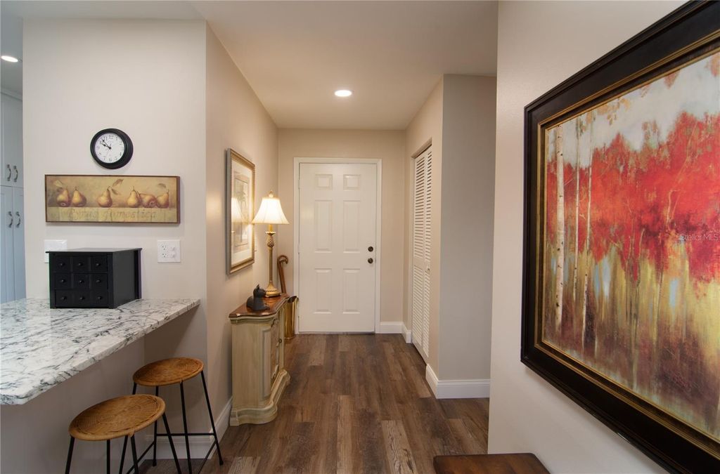 Photo of 5635 Golf Pointe Drive #101, Sarasota, FL 34243 (MLS # A4683974)