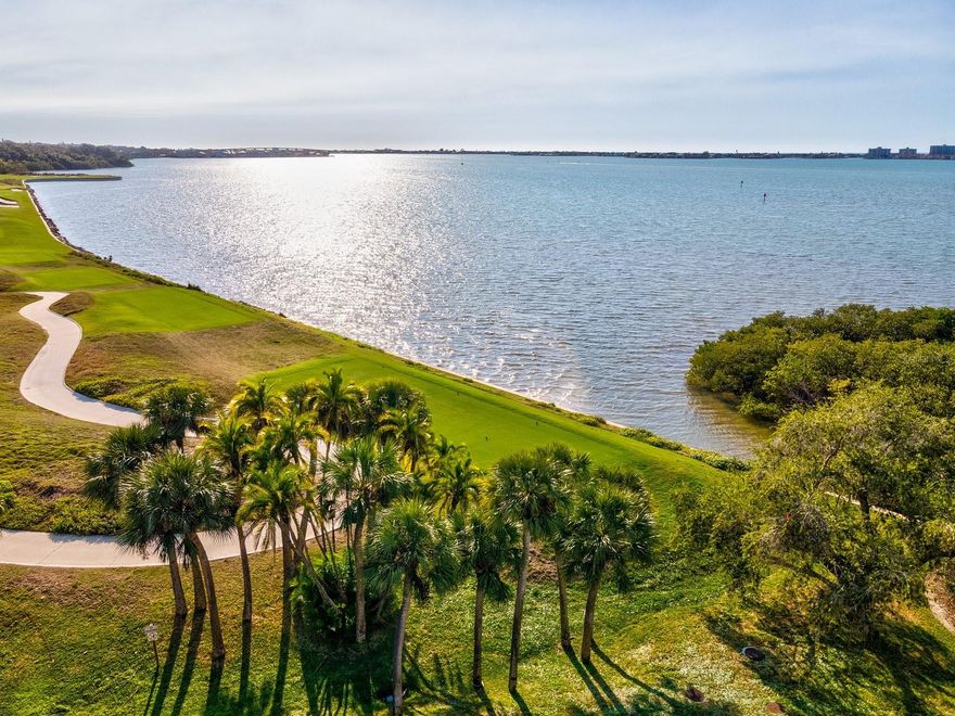 Where the Water Meets the Fairway — Elevated Penthouse Living. Perched on the penthouse level of South Garden Building 4, this residence offers a rare combination of expanded living space, sweeping views, and priority access to Belleair Country Club's membership waiting list. The penthouse level provides over 150 additional square feet, incorporated into the living room to create a noticeably more open and airy main living space. Located at the end of the residential buildings, the unit enjoys unencumbered, wide-angle views of both the golf course and the Intracoastal, enhancing privacy and perspective.

Interior features include laminate flooring throughout the main living areas, with elevated finishes in both baths. The primary bathroom showcases Calacatta marble imported from Portugal, while the guest bath is finished with ceramic tile. Quartz countertops are featured in both bathrooms, and the kitchen offers quartz surfaces complemented by a quartzite island with discrete additional storage, ideal for everyday living and entertaining. Custom-built bathroom vanities add thoughtful design and functionality. Offered furnished for immediate enjoyment.

Additional highlights include one assigned parking space and a private storage closet in the parking deck (approximately 4x8). Distinctive touches include a foyer mirror crafted from shingles reclaimed during the Belleview Biltmore deconstruction, a meaningful nod to the property’s history.

Ownership in this building places buyers at the top of the waiting list for Belleair Country Club, a highly sought-after benefit. Residents enjoy a gated, guarded setting, a private South Garden pool, and close proximity to the clubhouse, golf courses, dining, marinas, and Pinellas County’s renowned beaches.

A true penthouse offering where space, views, and location come together.